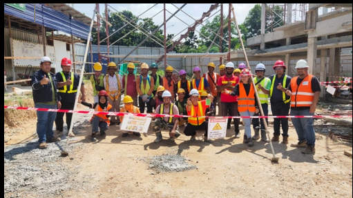 Site team with safety signage